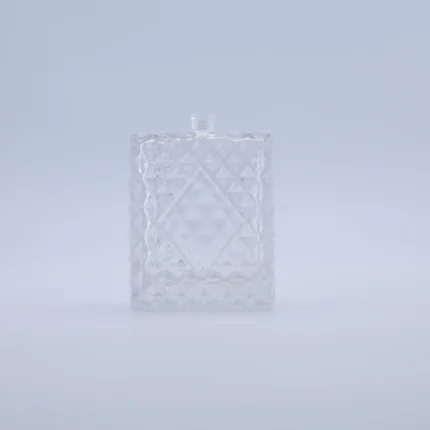 NS-R24 100ml perfume bottle with a premium glass design featuring an elegant geometric pattern