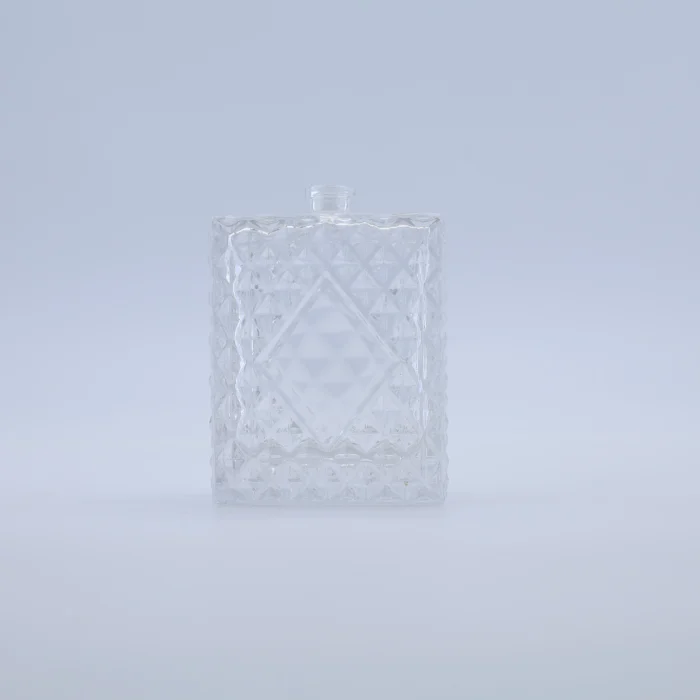 NS-R24 100ml perfume bottle with a premium glass design featuring an elegant geometric pattern